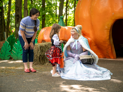 Cinderella at Large Pumpkin with mother and daughter