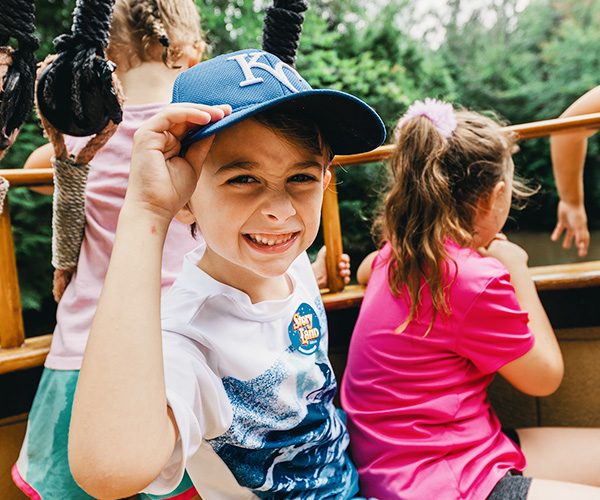 kids on a park ride at storyland