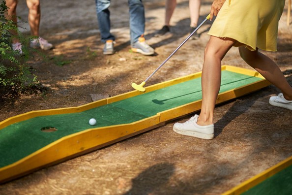 Playing mini golf